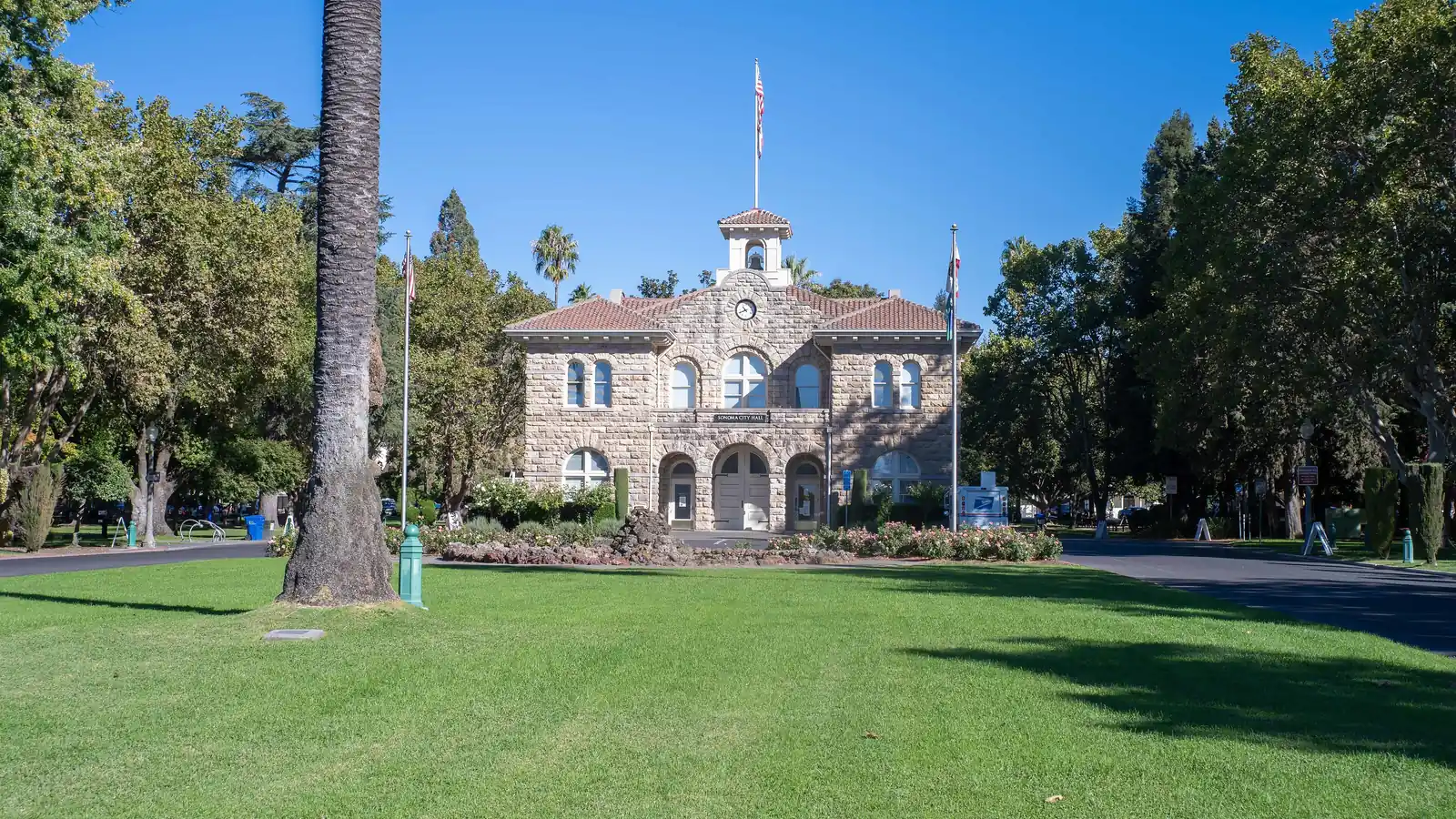 Sonoma City Hall across the west lawn of the historic Sonoma Plaza